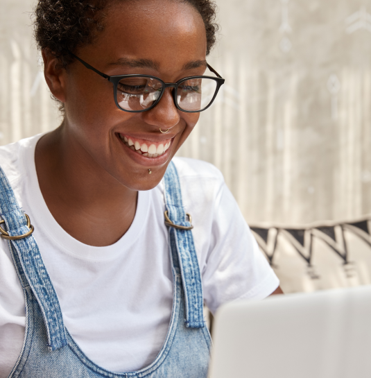 glad black female student prepares university exam works coffee shop